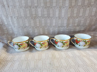 8 Piece Christian Dior "Dior Christmas" Teacup and Saucer Sets