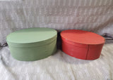 Vintage Pair of Green and Red Nesting Shaker Boxes