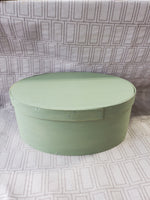 Vintage Pair of Green and Red Nesting Shaker Boxes