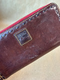 Dooney & Bourke Brown Leather Whipstitch Zip Around Wallet With Red & Green Interior