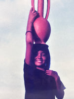 Young Woman with Terra Cotta Vessel  on Her Head
