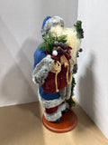 Santa Clause Statue With Blue Jacket