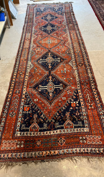 (A) Navy/Rust Hand Woven Rug, 16 1/2 ft  x 5 ft.