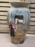 Vase with 3-D Farmer Feeding Straw to Horse in Stable