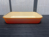 Le Creuset Orange Cast Iron Enameled Rectangular Roasting Dish with Metal Wire Handles