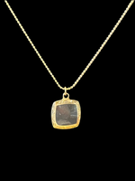 Gold Tone Necklace with Gold/Black Pendant