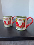 Pair of Nancy Thomas Celebrate Santa Coffee Mugs (B)