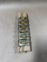 Silver And Brass Bow Napkin Rings