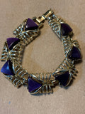 Gold Tone Bracelet with Purple Triangle Stone