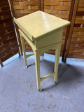 Yellow Painted Book Stand on Casters