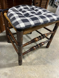 Round Table with (2) Leaves and (4) Ladder Back Chairs, with Plaid Seat Cushions.