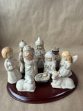 11 Piece Ceramic Nativity Set With Wood Base