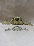 (A) Pair Of Brass Ribbon And Bow Wall Hangings