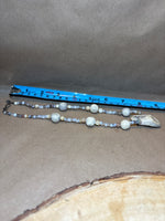Beaded Necklace with Carved Pendant
