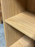 Particle Board Bookcase with Adjustable Shelves; cardboard backing