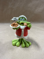(A) Russ Douglas Christmas Santa Bobble Frog