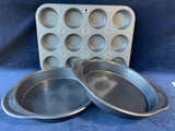 Two Wilton 9” Round Nonstick Cake Pans and 12 Cup Muffin Pan (Unbranded)