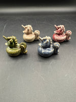 Lot Of 4 Glazed Pottery Unicorn Ducks