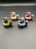 Lot Of 4 Glazed Pottery Unicorn Ducks
