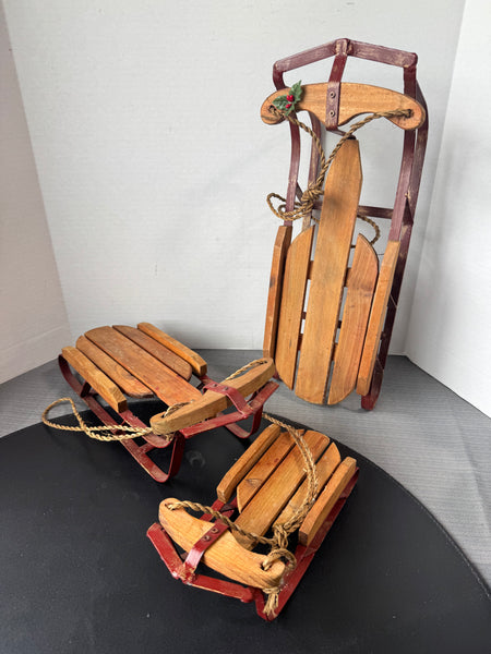 Trio of Ganz Wooden & Red Metal Decorative Sleds