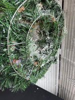 Faux Snowy Pine Wreath with Santa Ornaments