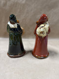 Pair Of Glazed Pottery Santa Clause Figures
