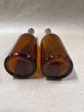 Pair Of Brown Glass Bottles