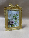 Gold Ornate Frame With Bow