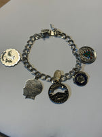 Sterling Charm Bracelet (One Charm is NOT Sterling)