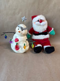 Snowman Holding Lights / Plush Santa