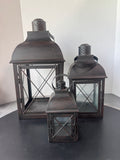 Trio of Distressed Bronzed Metal Lanterns