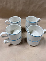9 Piece Stoneware With Blue Trim Coffee Mugs And Creamer