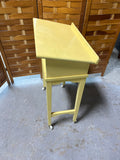 Yellow Painted Book Stand on Casters
