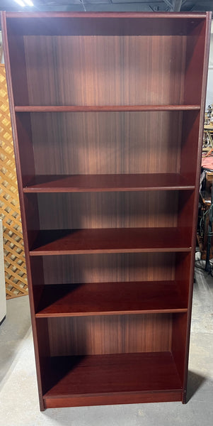 A- Particle Board Bookcase