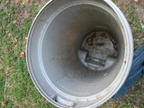 Rubbermaid Roughneck Rolling Plastic Trash Can with Lid, 32"H