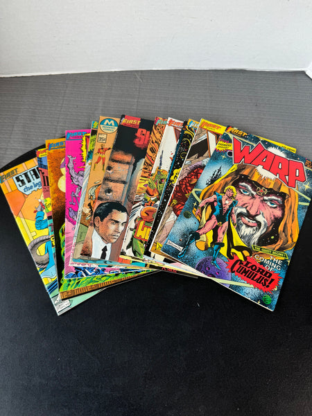 (B) Lot of 14 Assorted Vintage First Comics