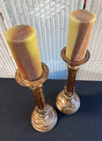 Pair of Bronze Look Ornate Pacific Rim Candlesticks with Pillar Candles