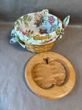 Round Woven Basket With Floral Fabric And Apple