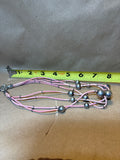 Silver Beads on Multi Strands of Pink Cord Necklace