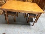 Dining Table with (4) Chairs by Ashley Furniture