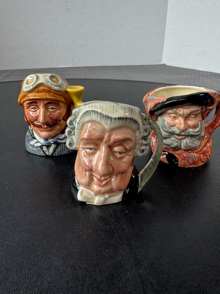(N) Trio of Royal Doulton England Toby Jugs: The Lawyer, Falstaff & Veteran Motorist