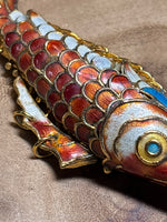 (B) Articulated Fish Pendant