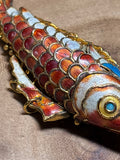 (B) Articulated Fish Pendant