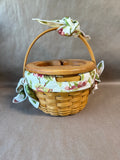 Round Woven Basket With Floral Fabric And Apple