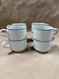 9 Piece Stoneware With Blue Trim Coffee Mugs And Creamer