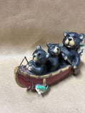 Bears In Canoe With Box