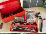 Red Metal Tool Box Packed Full of Tools