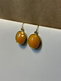 Gold Tone Earrings with Round Peach Faceted Stone