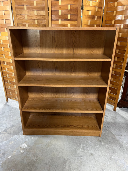 Oak Tone Particle Board Bookcase, Cardboard Backing