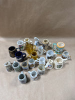 (A) 22 Piece Mini Stein Souvenir Glasses